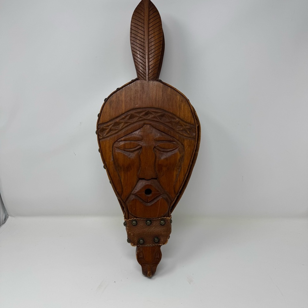 Antique folk, art fireplace, wood, and leather bellows Indian fox beaver